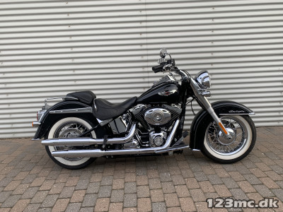 Harley-Davidson FLSTN Softail Deluxe HMC Motorcykler. Vi bytter gerne.