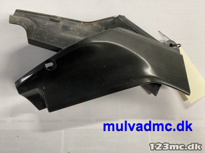 Inder panel atdækning