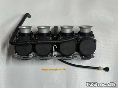 16100-MW0-600	CARBURETOR ASSY. (VP80B A)